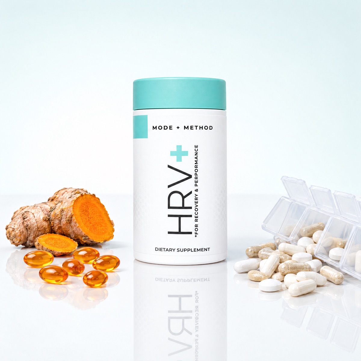 A bottle of Mode + Method HRV+ on a glossy white surface between fresh turmeric root with orange softgels and a tipped-over pill organizer spilling generic capsules.